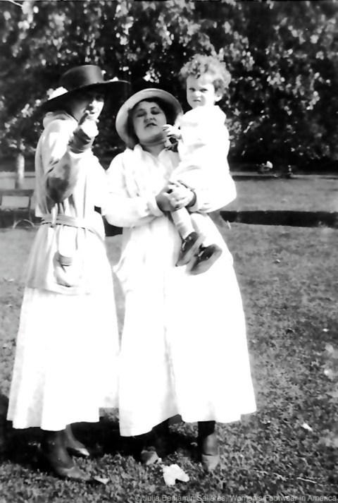My grandmother holding my father.
